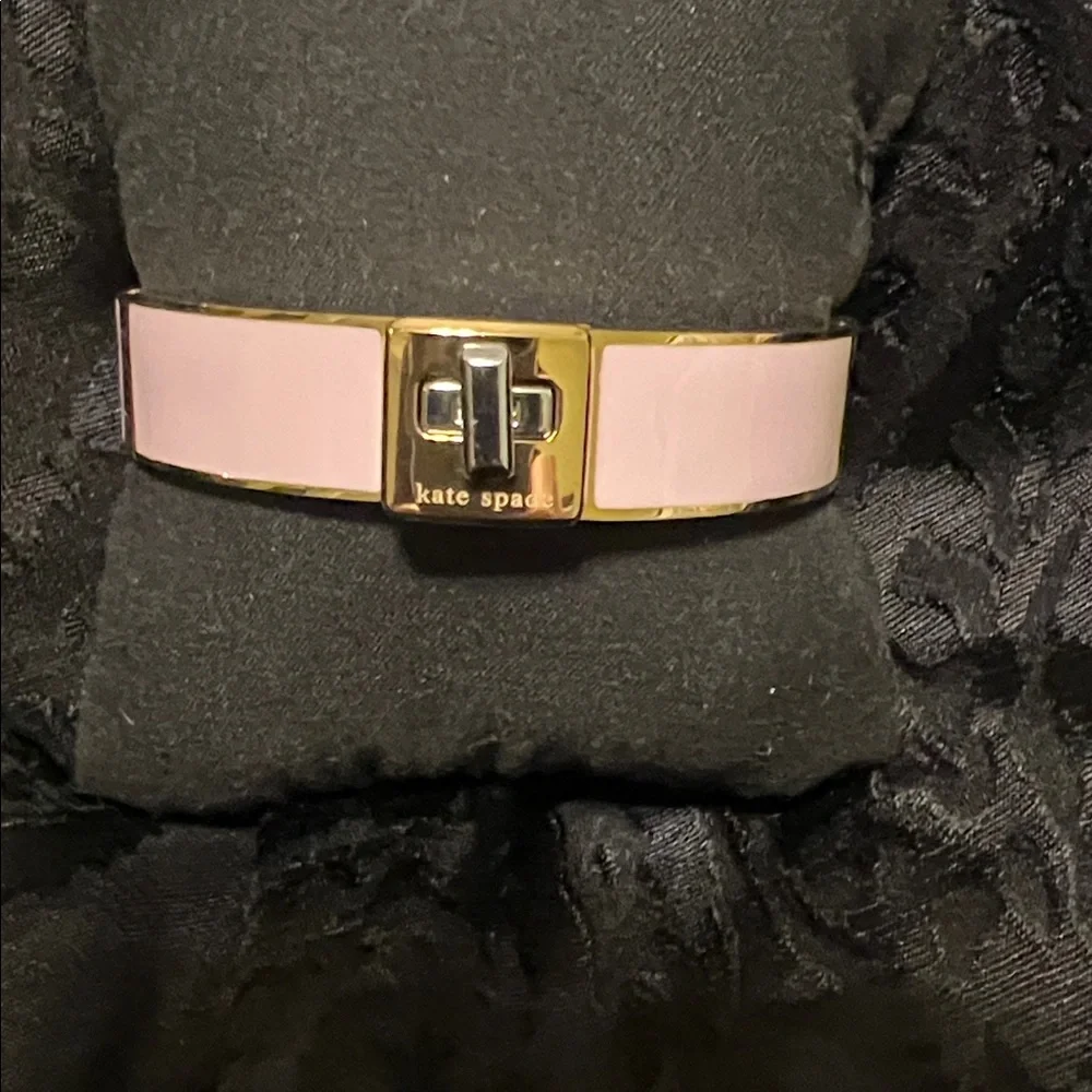 KATE SPADE, PHOEBE TURNLOCK ENAMEL PINK & GOLD BANGLE - Picture 2 of 9